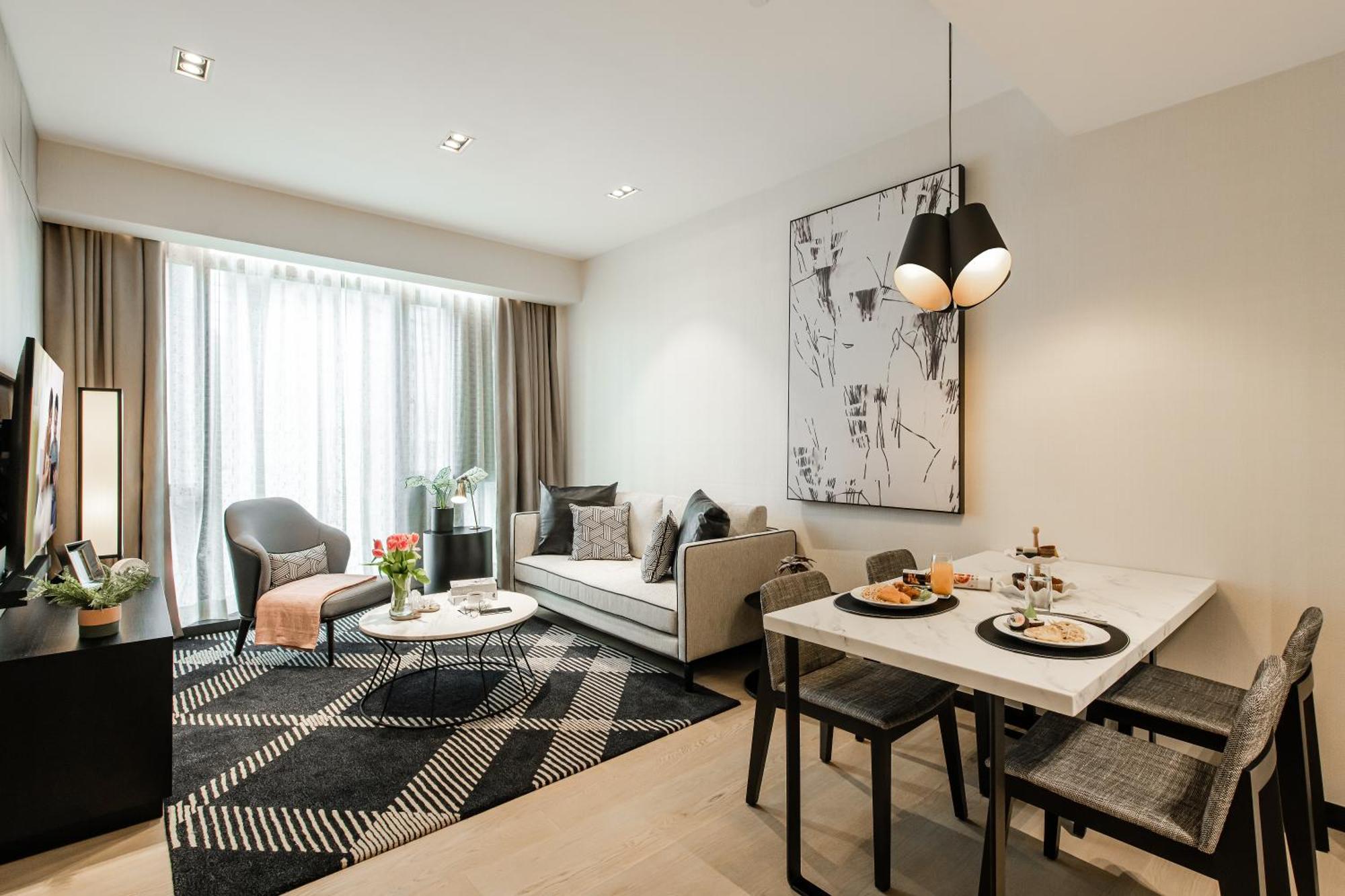 Ascott Star Klcc Kuala Lumpur Exterior foto A living room in a serviced apartment in Hong Kong